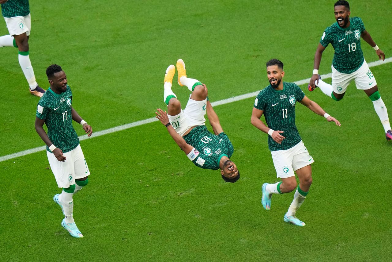 Saudi Arabia's Salem Al-Dawsari, second left, celebrates after scoring his side's second goal during the match against Argentina on November 22.