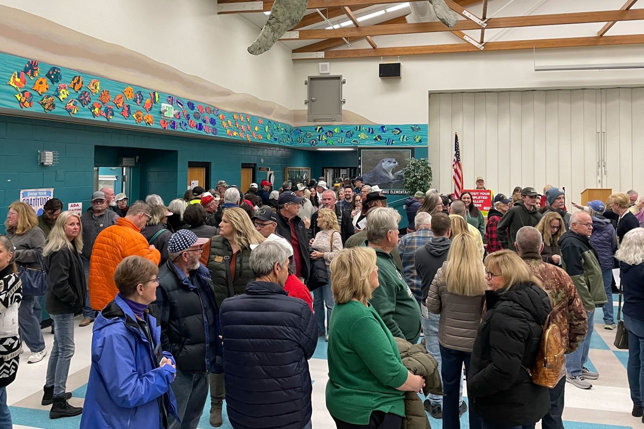 People wait for the caucus to begin at Spanish Springs Elementary School in Sparks, Nevada on Thursday.