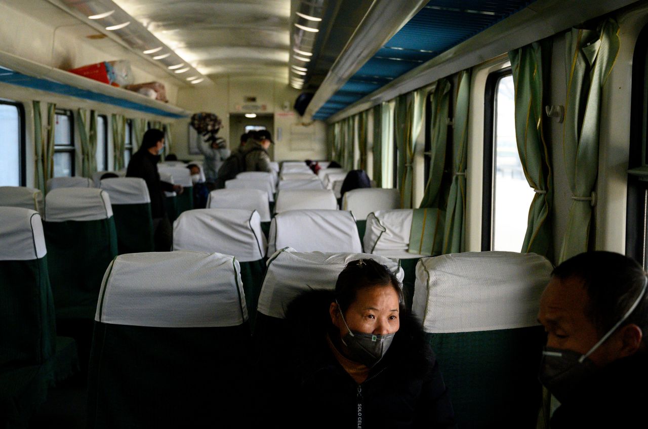 Passengers on a train at the Shanghai South railway station on February 9, 2020.