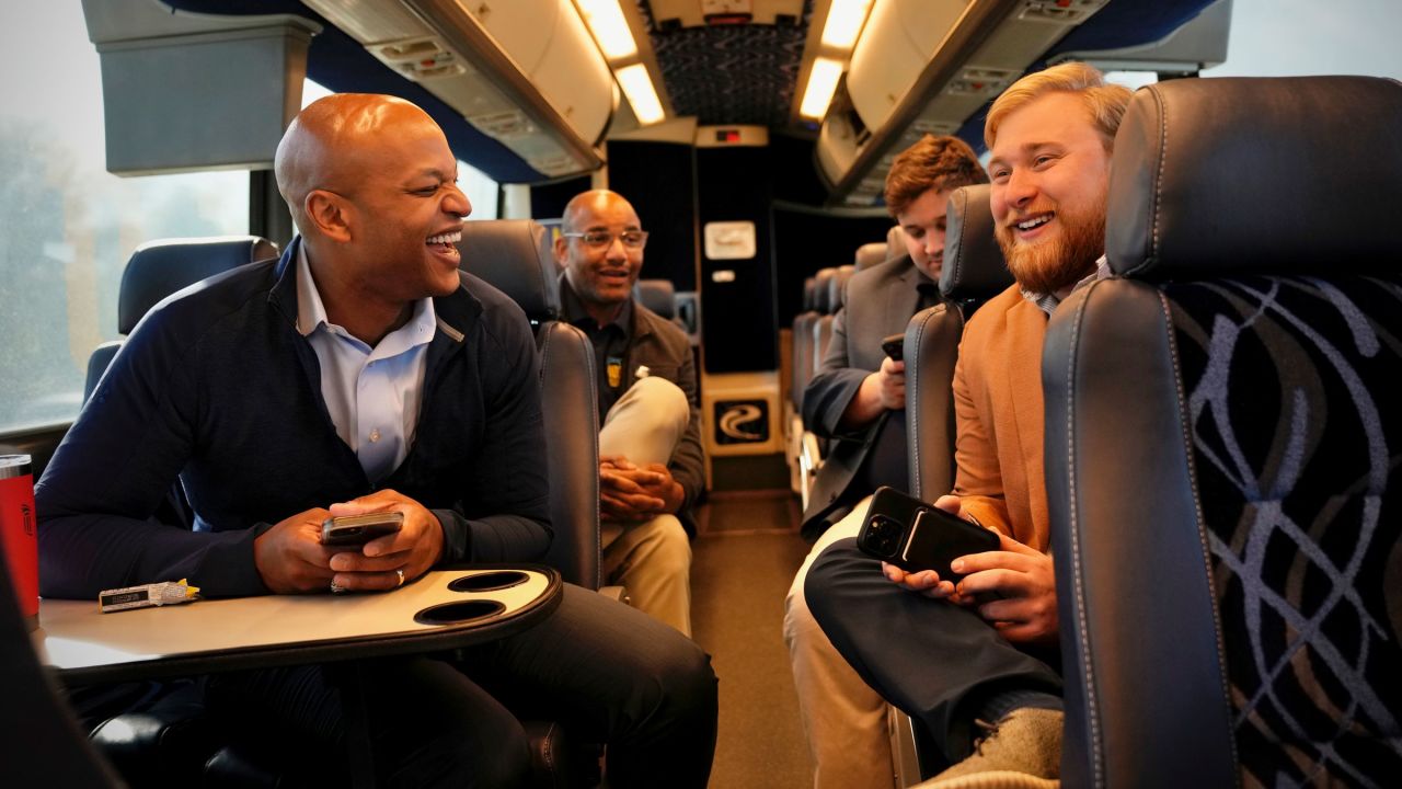 Moore speaks with his campaign staff while traveling between campaign stops in Baltimore on Election Day morning.