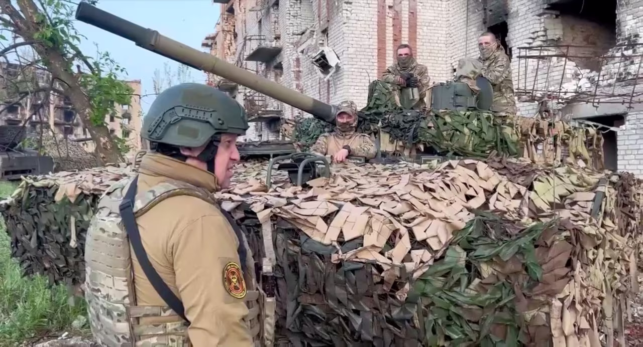The founder of Wagner private military group, Yevgeny Prigozhin, talks to Wagner fighters in Bakhmut, Ukraine, in this still image taken from video released May 25.