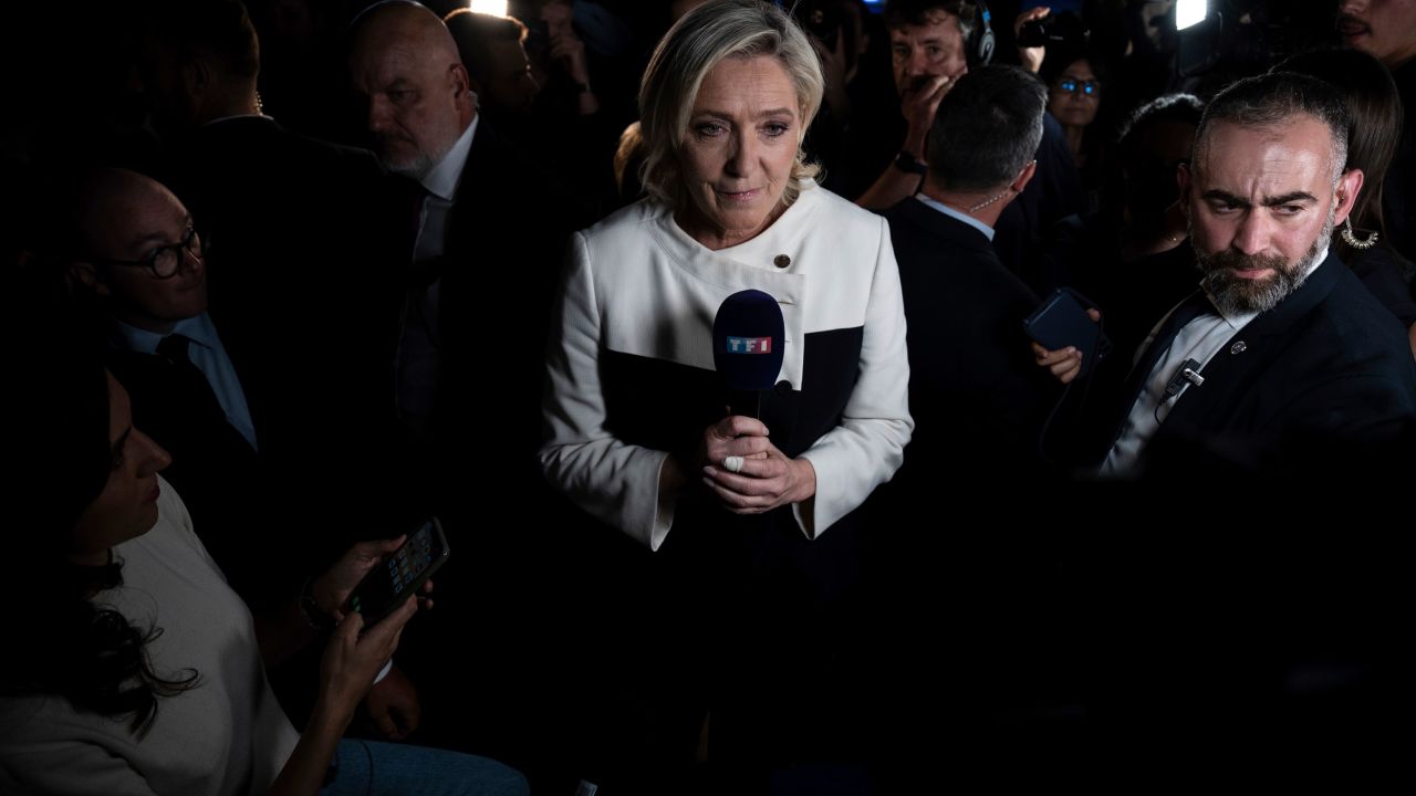 Marine Le Pen, leader of the far-right National Rally party, told reporters in Paris that partial results showed her party would not win a majority. 