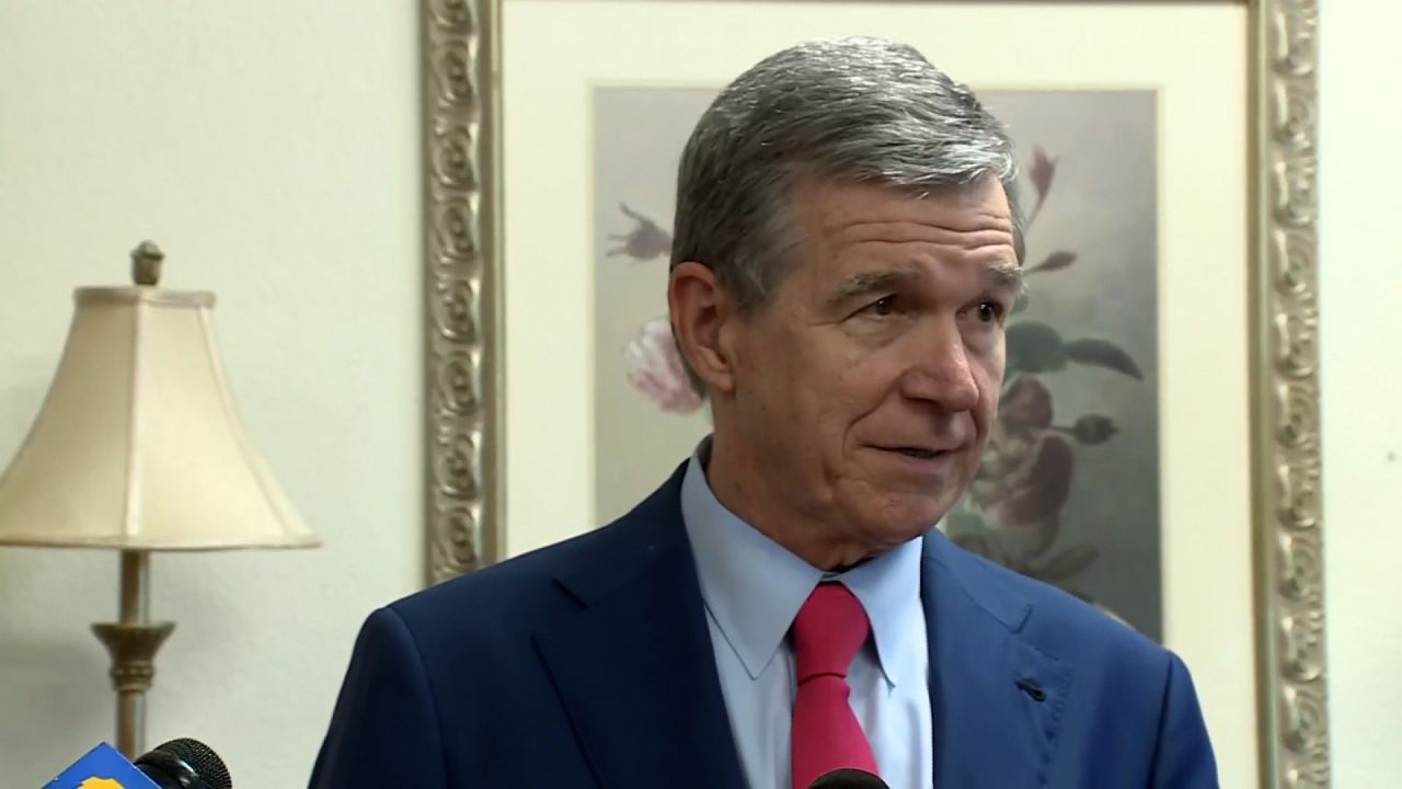 Gov. Roy Cooper speaks to reporters in Winston-Salem, North Carolina, on Tuesday.