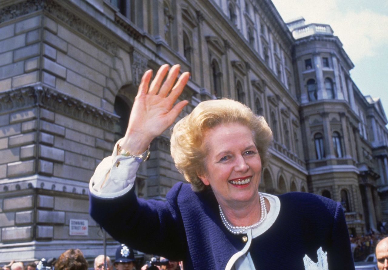 British Prime Minister Margaret Thatcher waves outside 10 Downing Street in London on election day, June 11, 1987. The vote resulted in the third consecutive victory for Thatcher's Conservative Party. Photo: Fox Photos/Hulton Archive/Getty Images