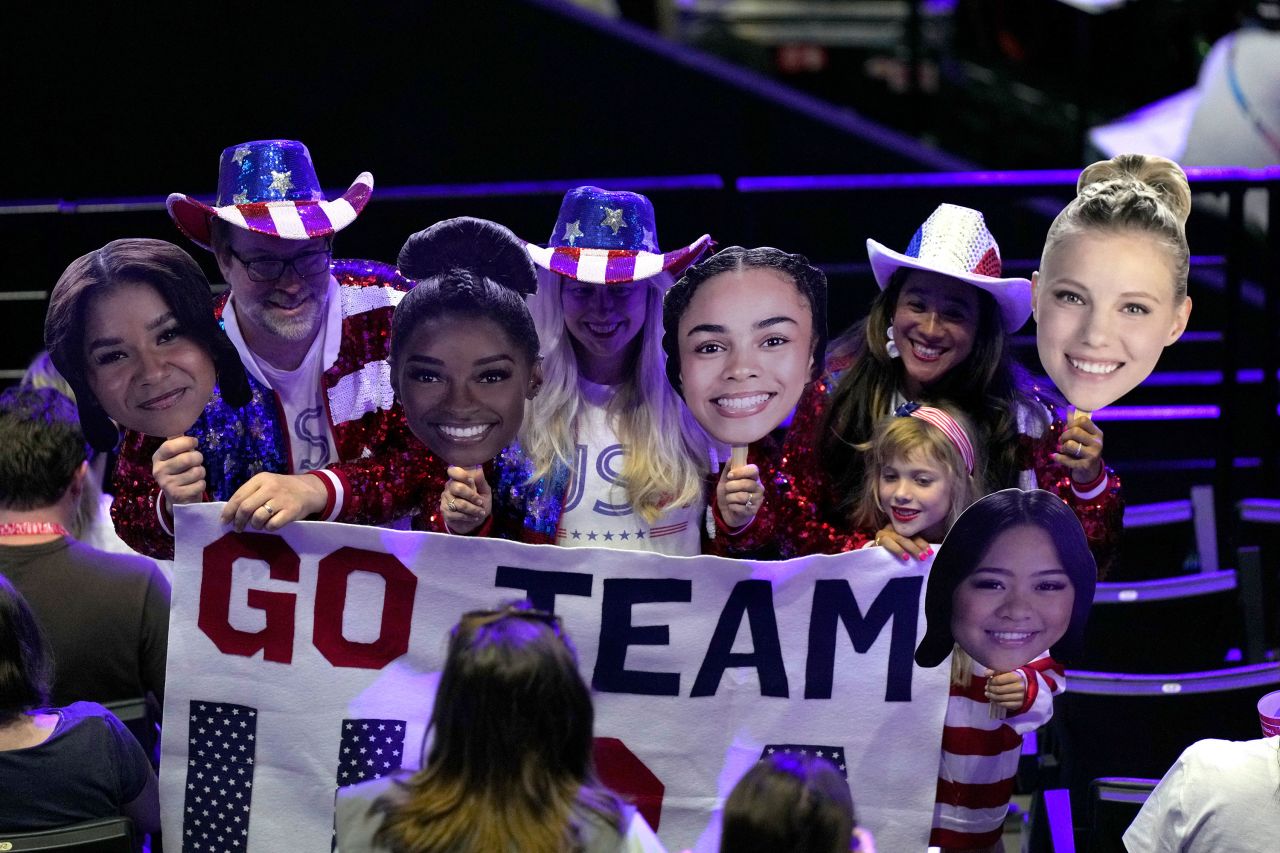 Fans cheer for Team USA before the start of the women's artistic gymnastics team finals on Tuesday.