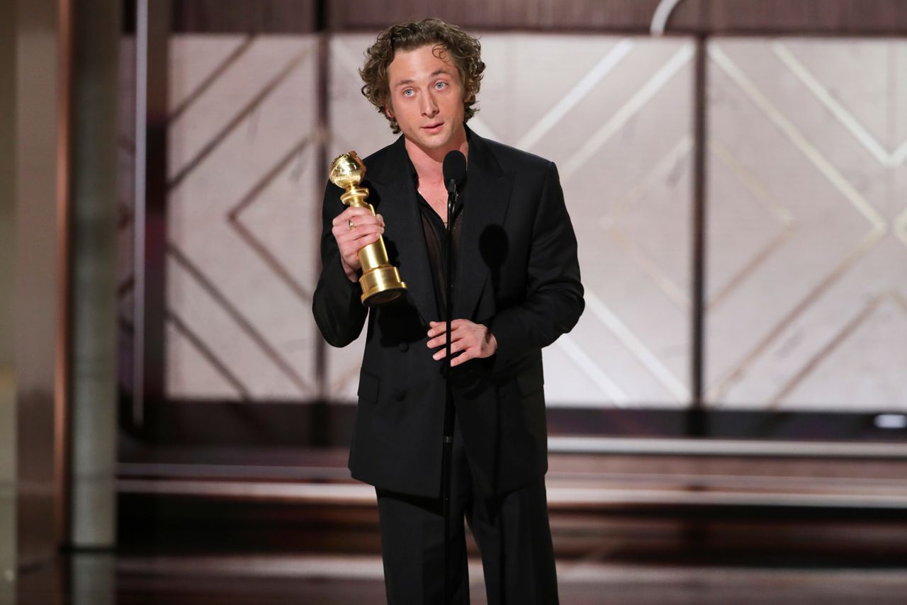 Jeremy Allen White accepts his Golden Globe award on Sunday. 