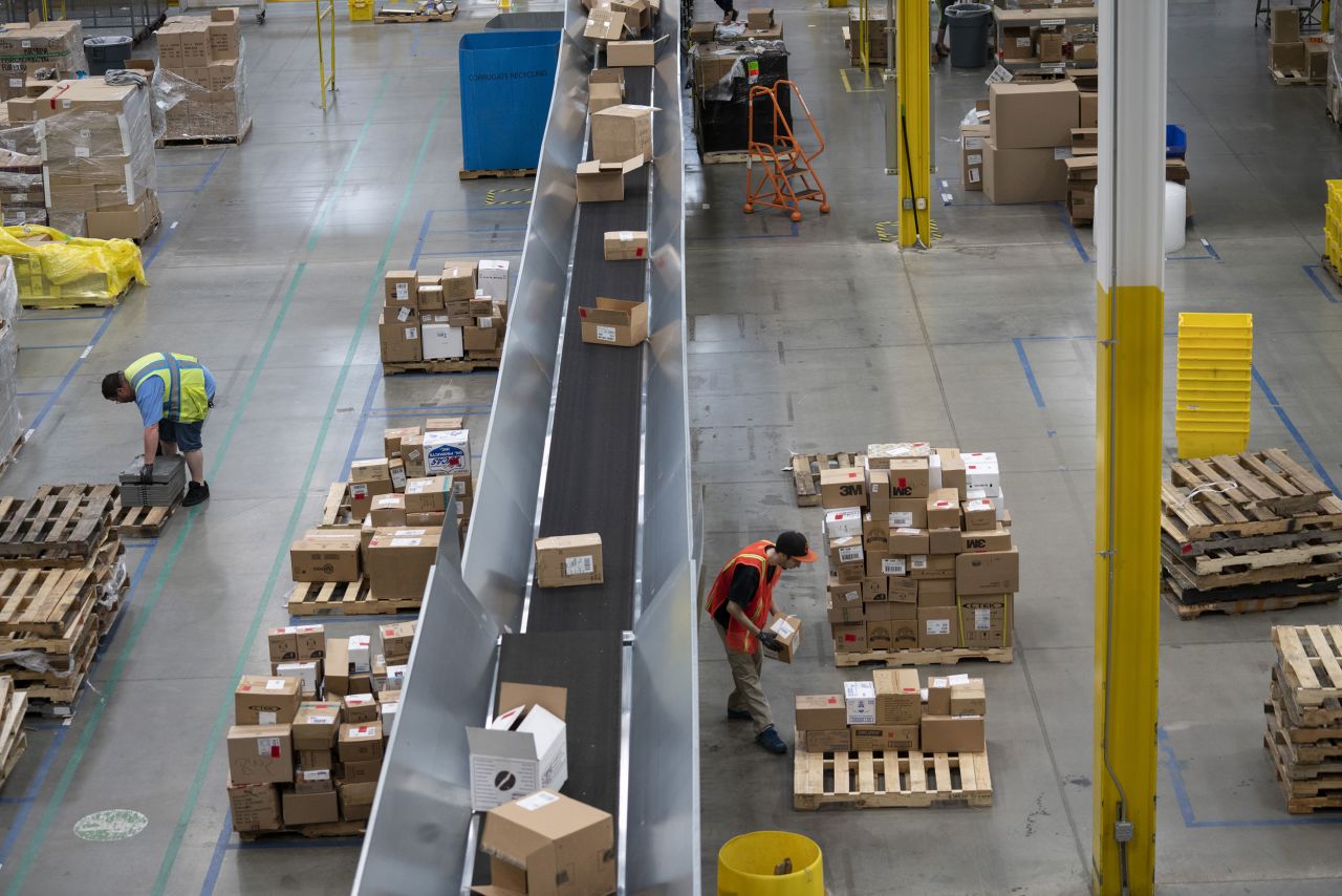 Employees work at the Amazon fulfillment center in Baltimore, Maryland.