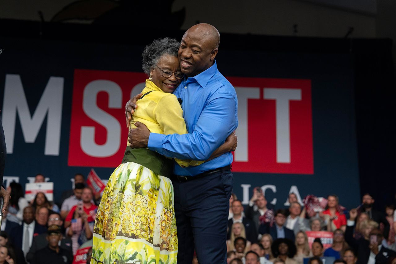 Sen.Tim Scott hugs his mother, Frances Scott, at a campaign event on May 22, in North Charleston, South Carolina. 