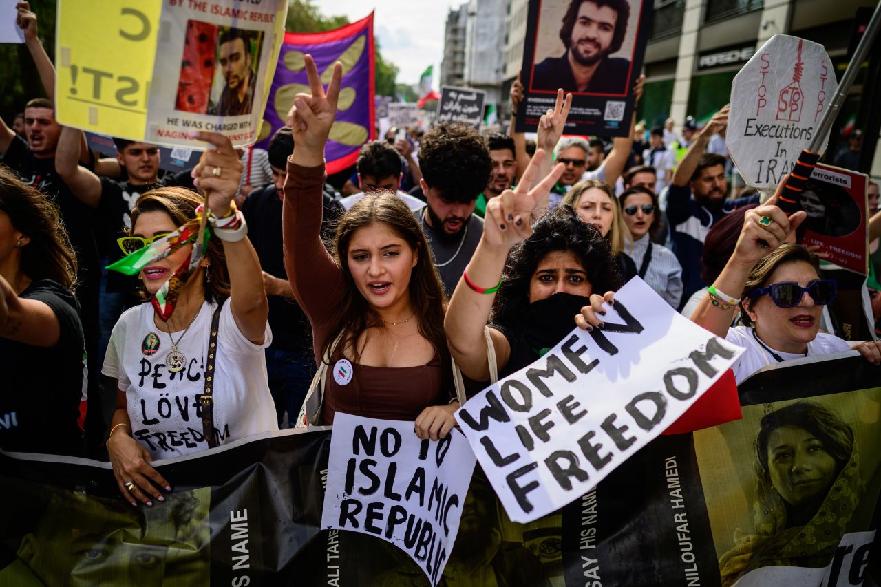 Protesters chant and hold banners as they take part in a march against the Iranian Islamic Regime on September 16, 2023, in London, England.