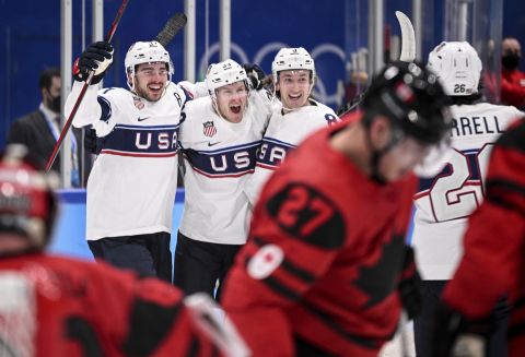 Team USA celebrates after scoring a goal in the men's ice hockey preliminary round group A match between Canada and the United States on Feb. 12. They ended up winning 4-2 against Canada, marking the US men's team's first Olympic ice hockey win against Canada in 12 years. 