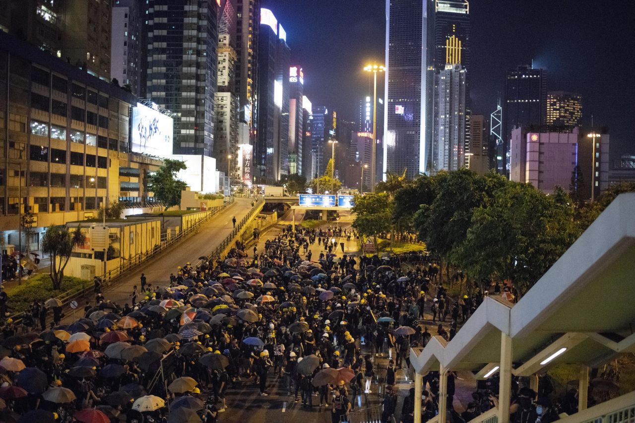 Protesters occupy Hong Kong's Gloucester Road on Sunday night.