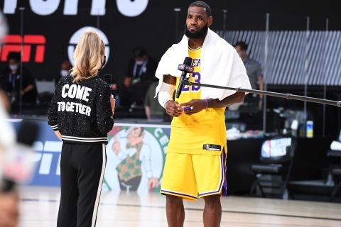 Turner Sports Reporter Allie LaForce interviews LeBron James #23 of the Los Angeles Lakers after a game against the Denver Nuggets during Game 4 of the Western Conference Finals on September 24, in Orlando, Florida at the AdventHealth Arena. 