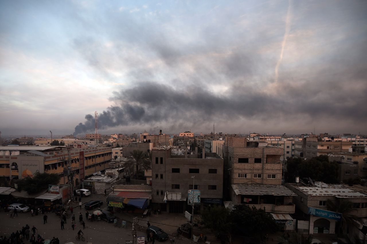 Smoke rises over Khan Younis, Gaza after Israeli strikes on Sunday, December 10. 