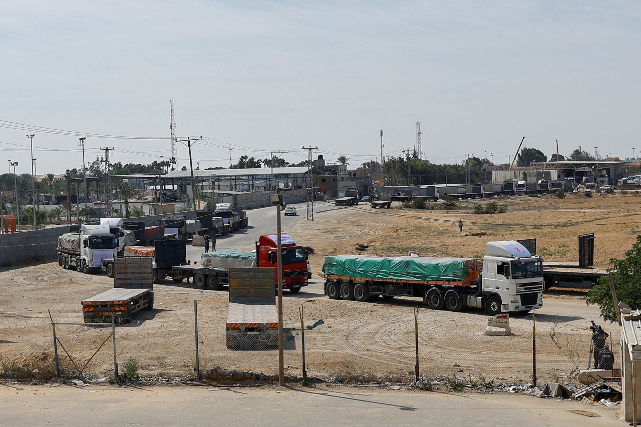 Trucks carrying aid wait to enter Gaza on October 21.