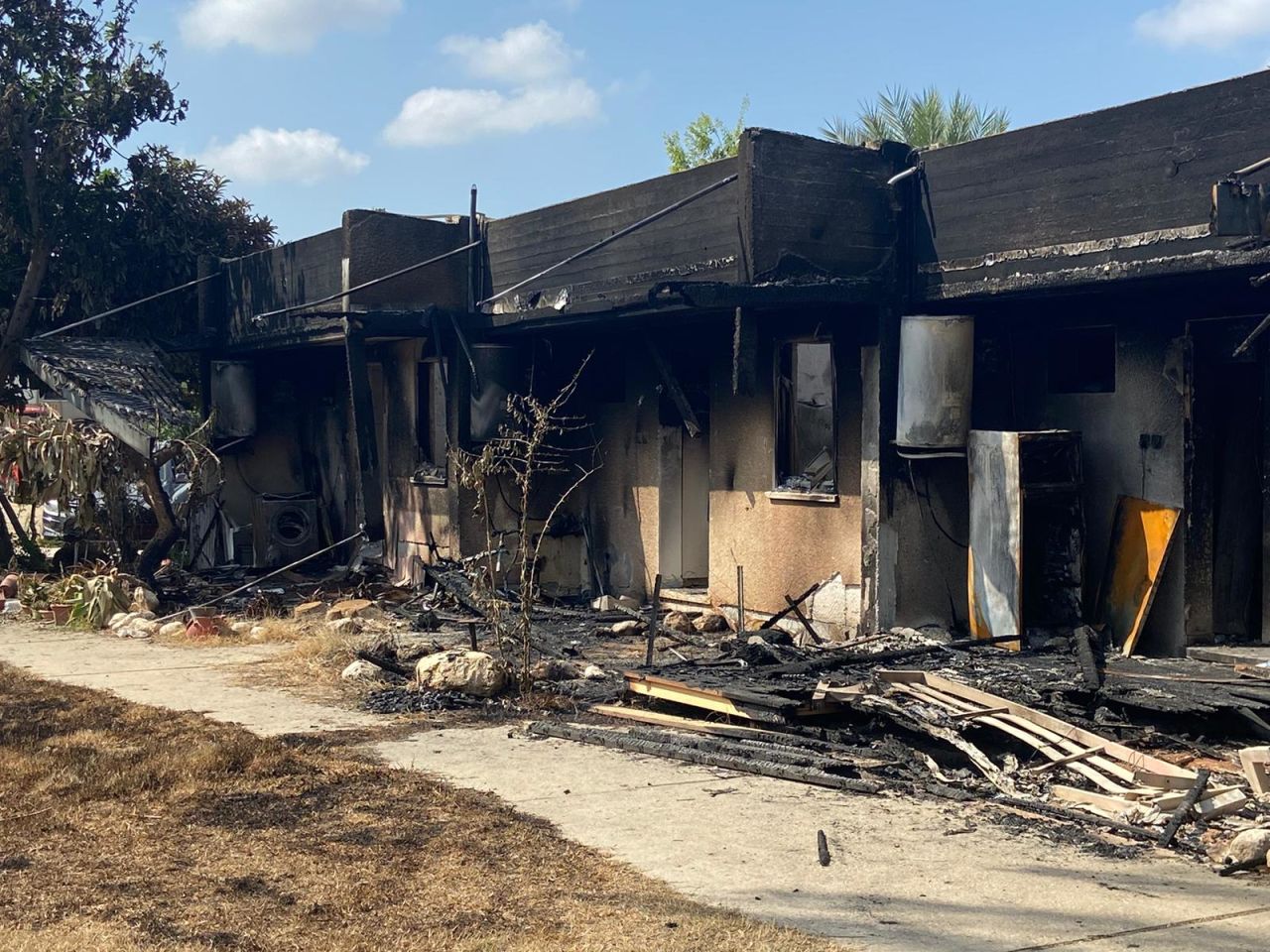 Burned out buildings are seen in the aftermath of attacks on Kibbutz Kfar Aza in southern Israel.