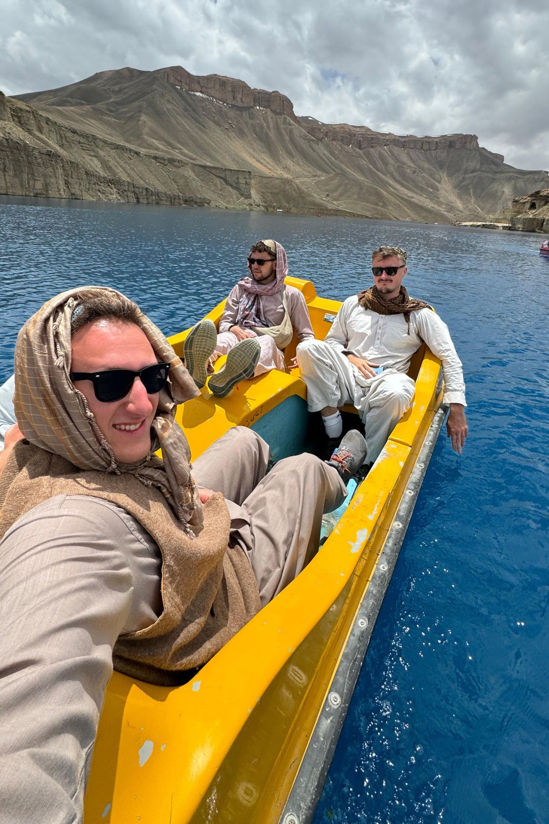 Content creator Ben Herskowitz and friends enjoying a pedal boat excursion on a lake in Band-e-Amir national park.