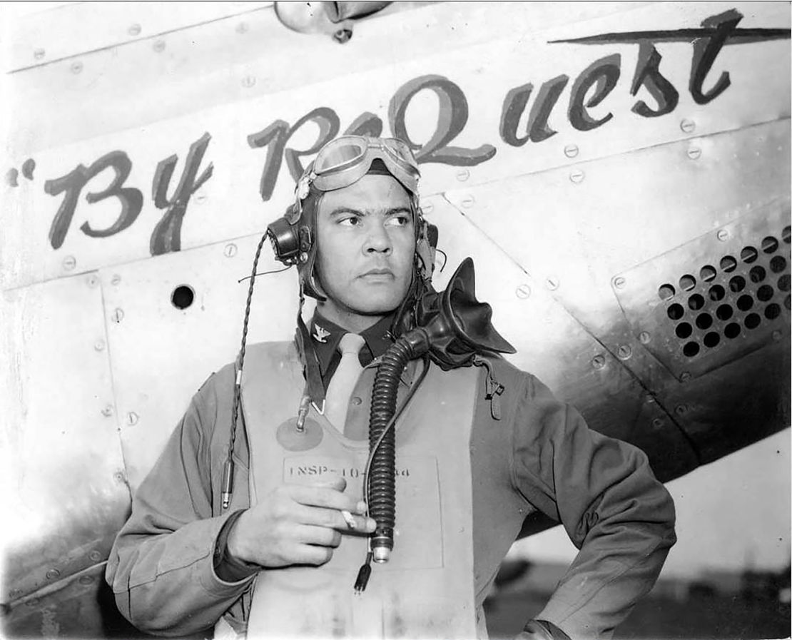 Benjamin O. Davis Jr. stands next to a P-51C Mustang “By Request” airplane, which he flew during World War II as part of the 99th Fighter Squadron, 332nd Fighter Group when unit was based in Italy in 1944.