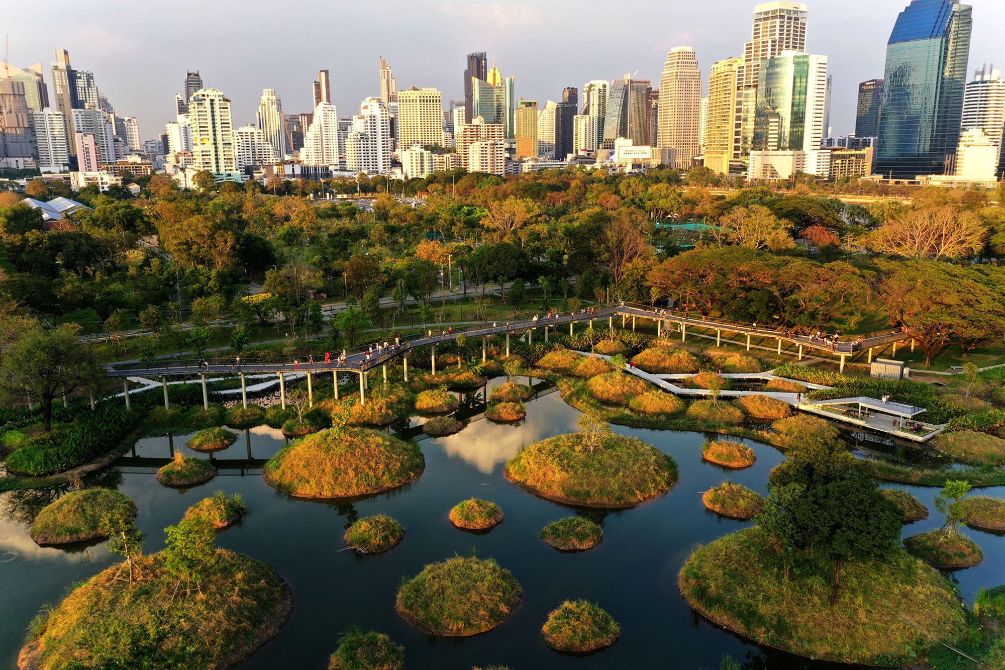 In Bangkok, Turenscape, alongside the Thai military and local firm Arsomsilp Community and Environmental Architect, transformed the concrete ground of a former tobacco factory into a man-made wetland with mini islands.