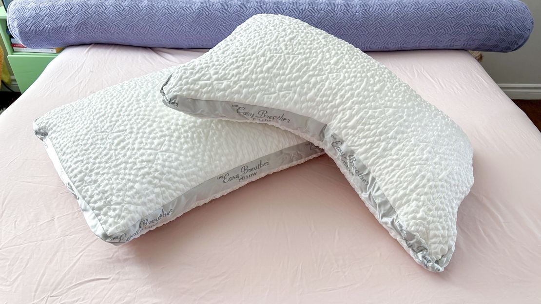 The different shapes of the Nest Bedding Easy Breather pillows on a bed