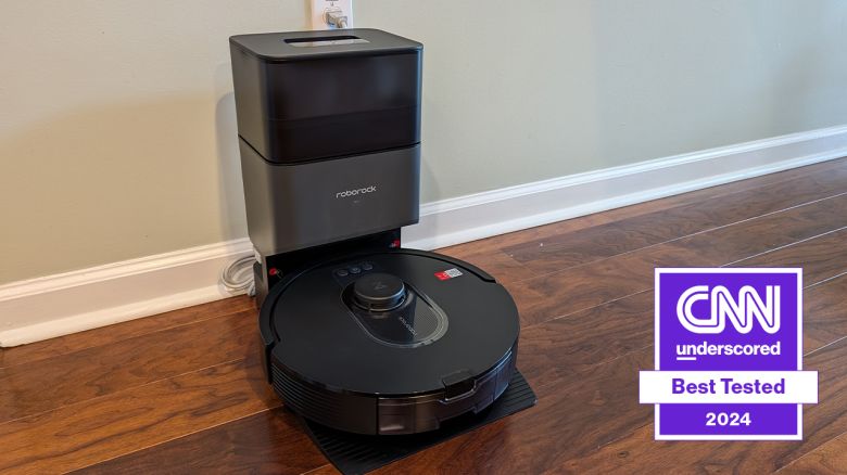 best robot vacuum the roborock in its charging base on wood floor