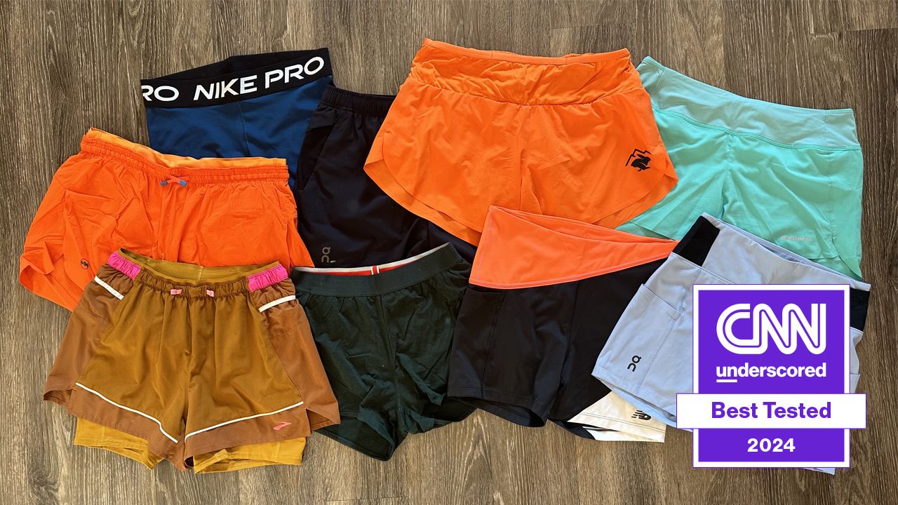 Eight running shorts displayed on floor
