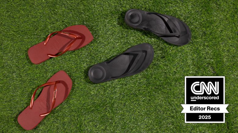 Two pairs of sandals on astroturf