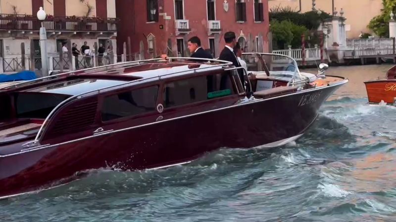 https://media.cnn.com/api/v1/images/stellar/prod/bezos-sanchez-boat.jpg?c=16x9&q=w_800,c_fill