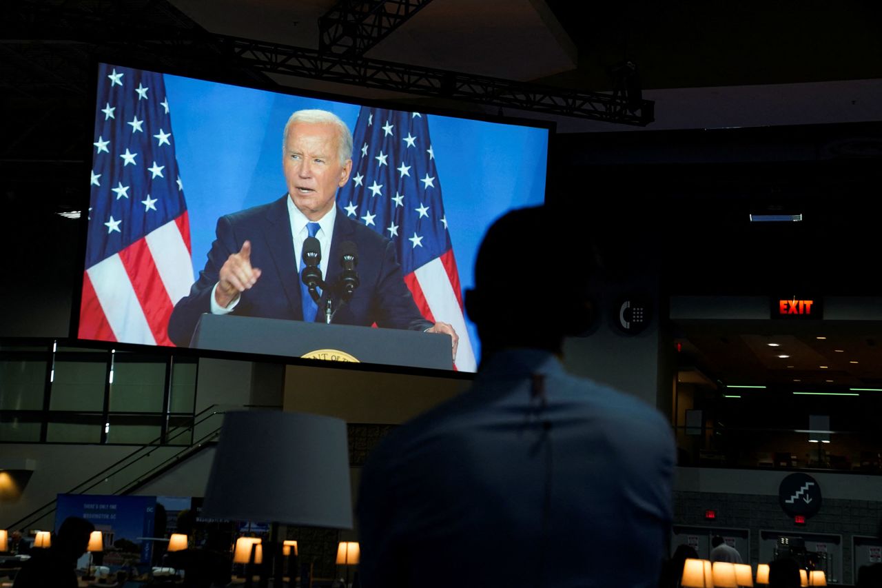 People in the International Media Centre watch a live feed of US President Joe Biden’s press conference during during NATO's 75th anniversary summit, in Washington, DC, on Thursday. 