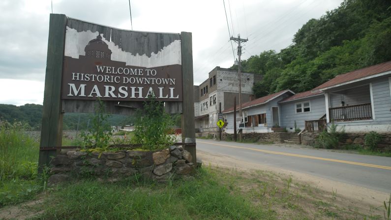 The welcome sign in Marshall. The town economy relies on tourists visiting for outdoor activities like rafting, kayaking or hiking portions of the Appalachian Trail.