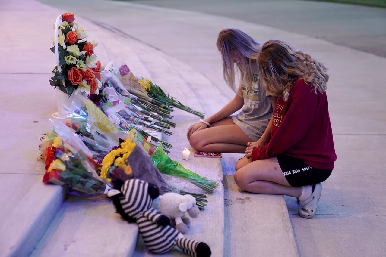 People attend a vigil at Jug Tavern Park, following the shooting at Apalachee High School in Winder, Georgia, on September 4.