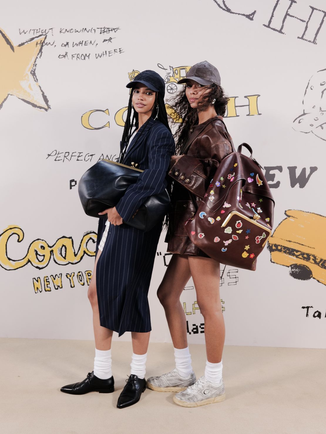 Coach played with scale this season, turning coin purses into weekender bags. Pinstripe trenches, weathered leather jackets and other classic Coach outerwear was given a youthful makeover, paired with satin mini dresses, stickered backpacks and retro sneaker accessories.