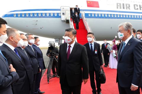 Chinese President Xi Jinping, center, is met by Kazakhstan's President Kassym-Jomart Tokayev, right, as he arrives at the Nur-Sultan Nazarbayev International Airport on September 14 in Kazakhstan. 