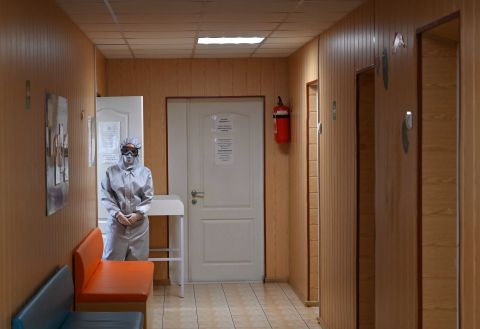A medical worker waits for patients inside a clinic in the Ukrainian town of Irpin on April 15.