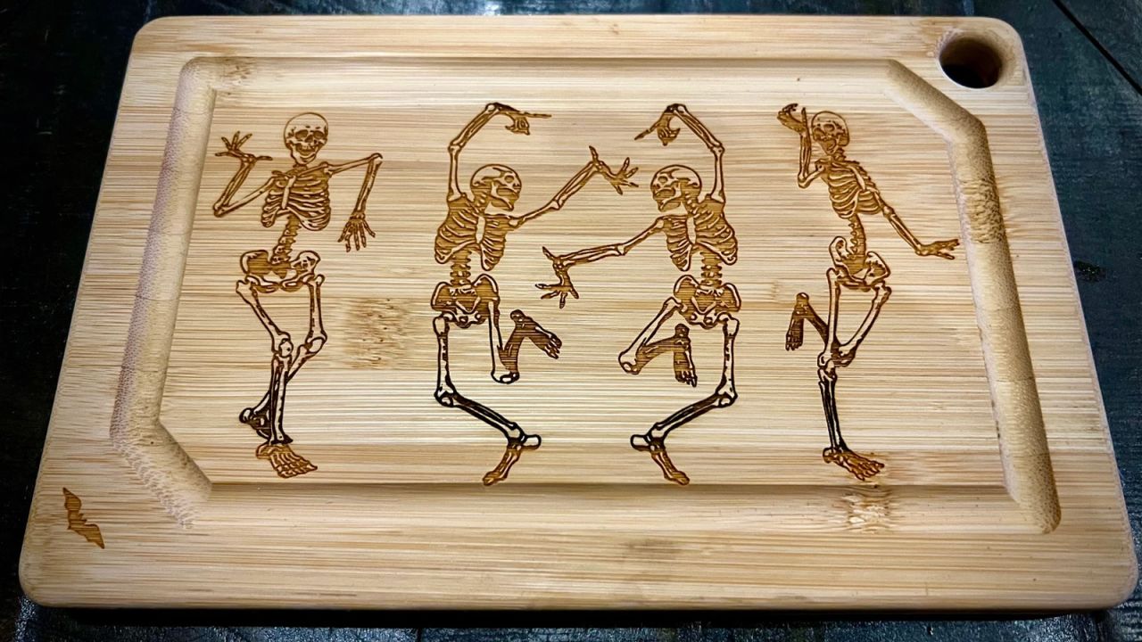 Black Spot Creations Dancing Skeletons Charcuterie Board.jpg