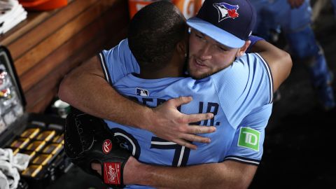 LOS ANGELES, CALIFORNIA - OCTOBER 29: Trey Yesavage #39 of the Toronto Blue Jays is congratulated by Vladimir Guerrero Jr. #27 after pitching the seventh inning against the Los Angeles Dodgers in game five of the 2025 World Series at Dodger Stadium on October 29, 2025 in Los Angeles, California. (Photo by Luke Hales/Getty Images)
