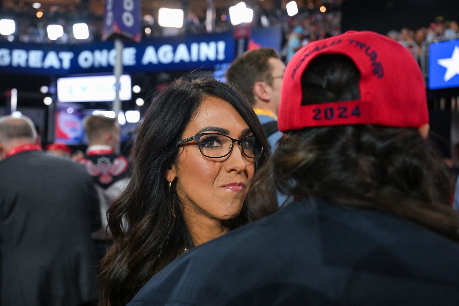 US Rep. Lauren Boebert speaks to a delegate at the convention on Thursday.