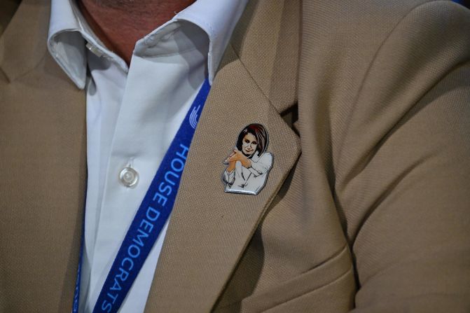 A convention attendee wears a Pelosi button on Monday.