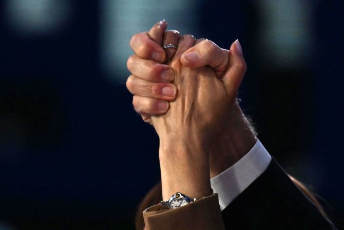 Biden and Harris hold hands after his speech. “She’ll be a president we can all be proud of, and she will be a historic president who puts her stamp on America’s future," Biden said in his speech.