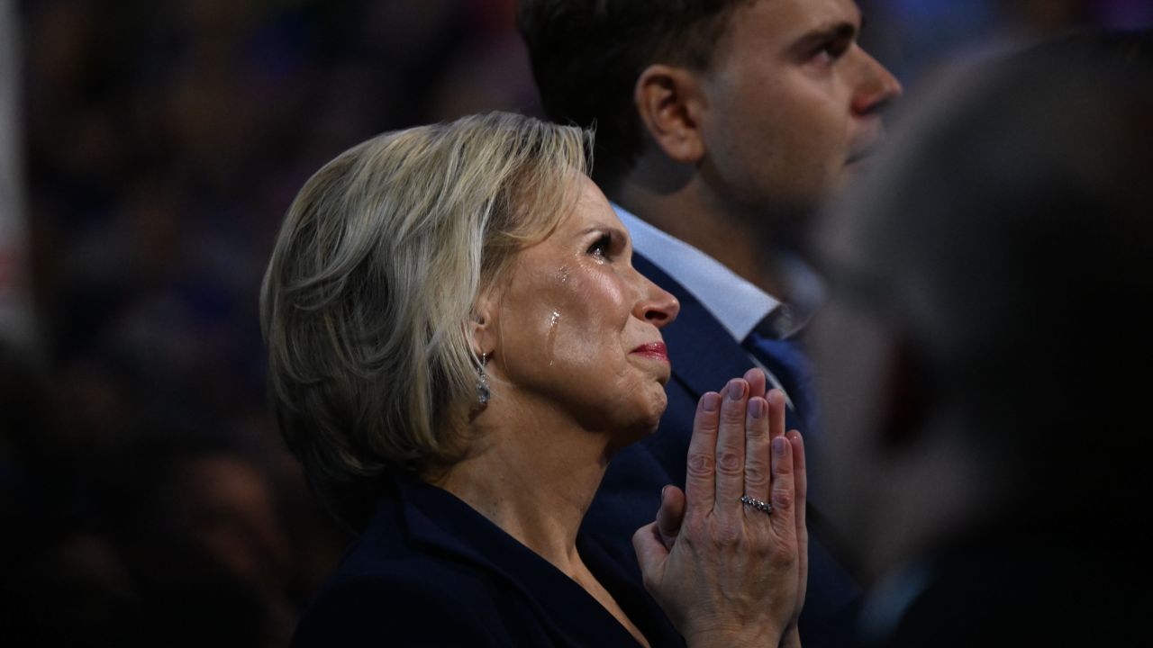 Tim Walz' wife, Gwen, cries during the introduction video before his speech at the DNC on August 21.