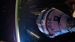 Boeing’s Starliner spacecraft that launched NASA’s Crew Flight Test astronauts Butch Wilmore and Suni Williams to the International Space Station is pictured docked to the Harmony module’s forward port. This long-duration photograph was taken at night from the orbital complex as it soared 258 miles above western China.