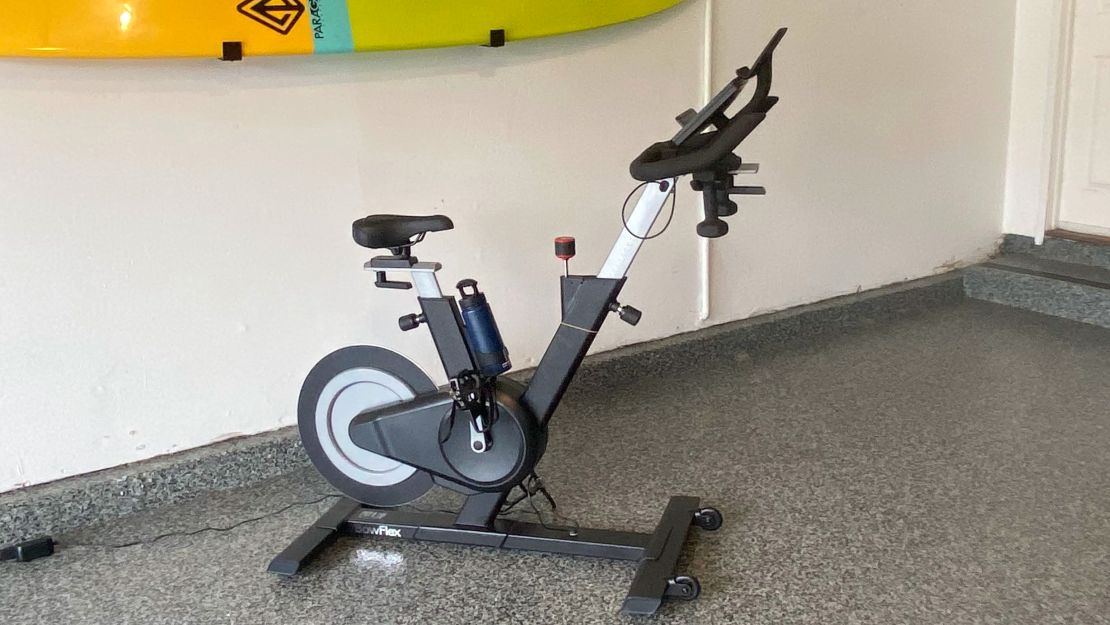 A Bowflex IC Bike SE in a garage.