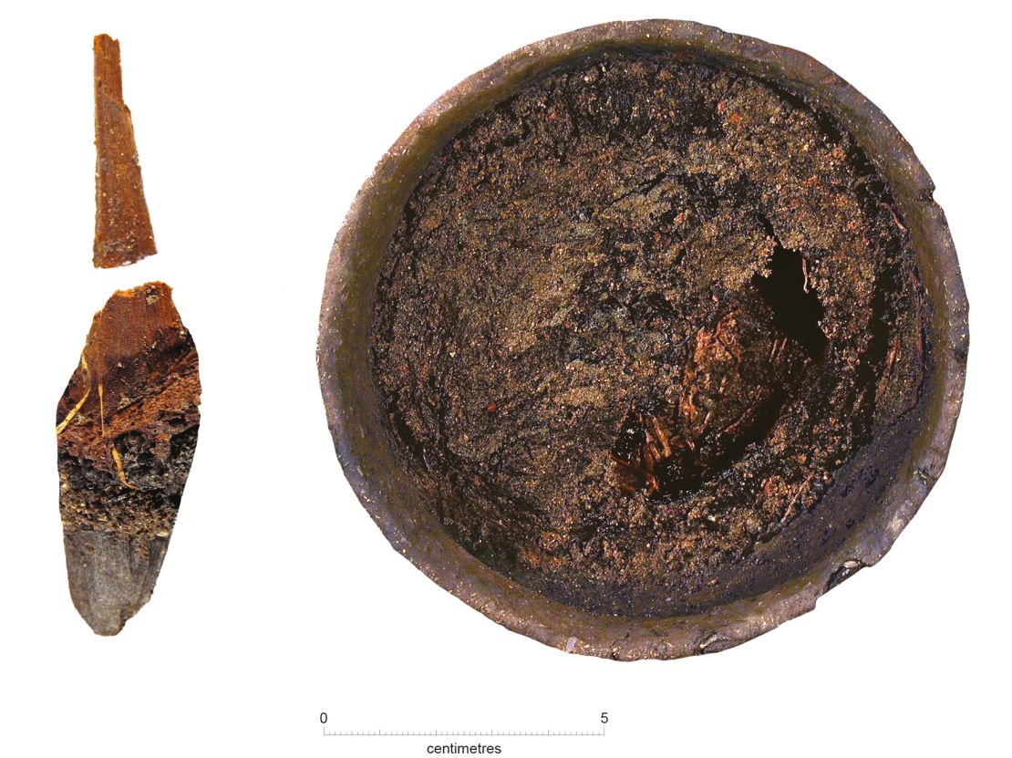 Analyses of Bronze Age dishes found at the site, such as the spoon (left) and bowl (right) shown here, have helped reveal what Must Farm inhabitants ate.