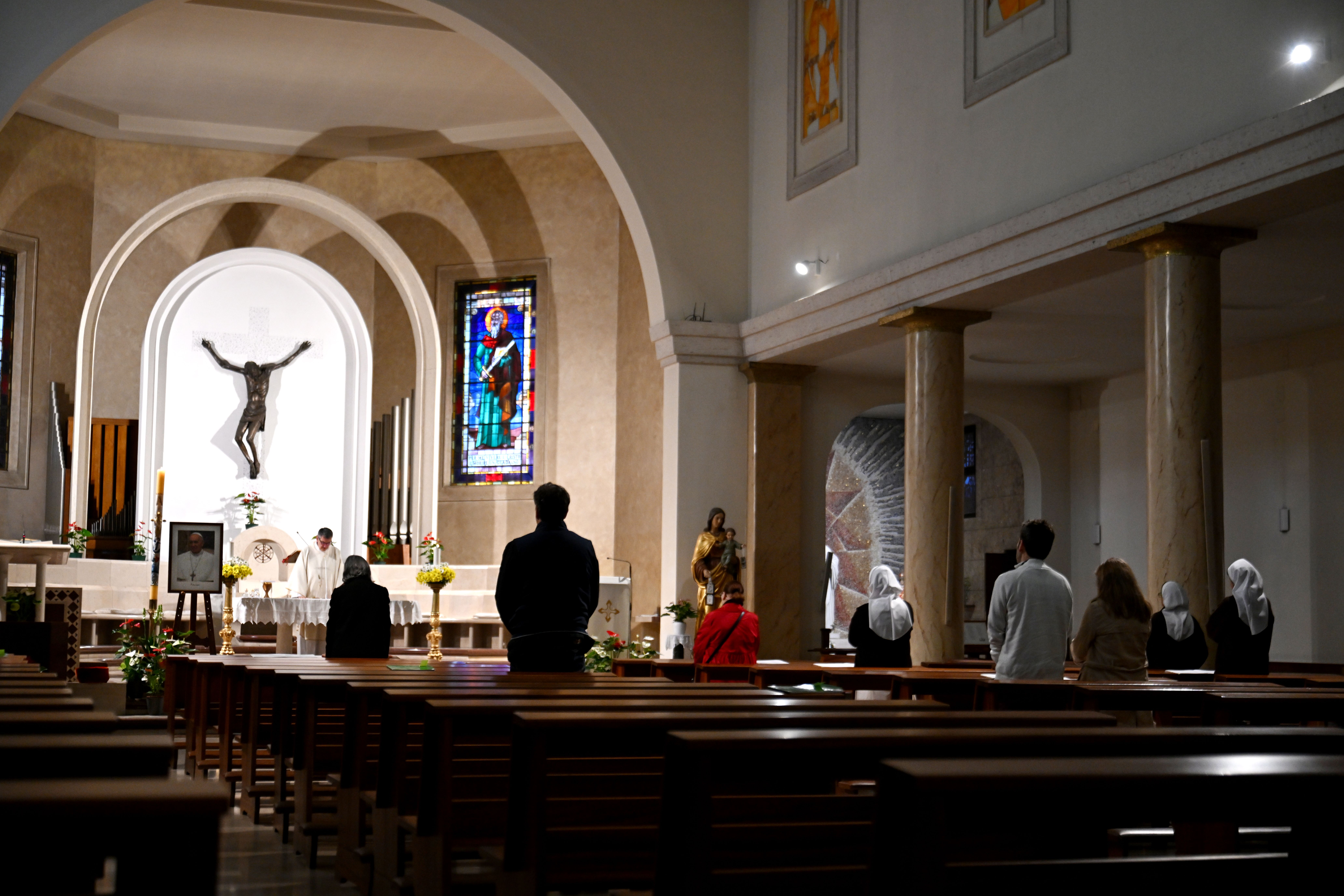 A Mass is held at the Church of Santa Lucia in Rome on Thursday.
