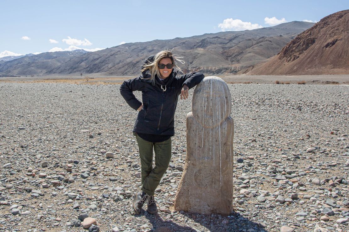 Made it! The writer celebrates a successful crossing into western Mongolia after weeks on the road.