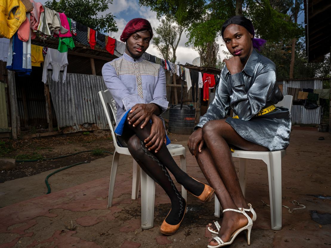 An image by Brent Stirton shows two trans women who fled harsh anti-LGBTQ laws in Uganda and are now living in a safe house in Nairobi, Kenya.