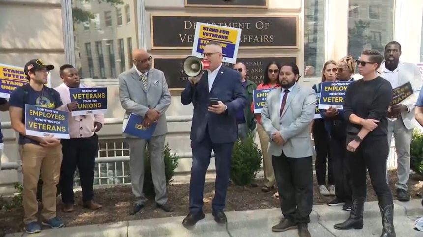 Veteran Jake Pannell, center, speaks during a demonstration outside the Department of Veterans Affairs in Washington, DC, on September 23, in this screenshot taken from a video.