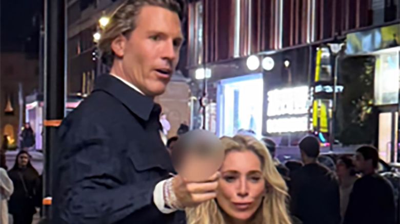 Detectives have released an image of two people they want to speak to following an incident in which a woman was assaulted and subject to racial abuse with her family in central London.