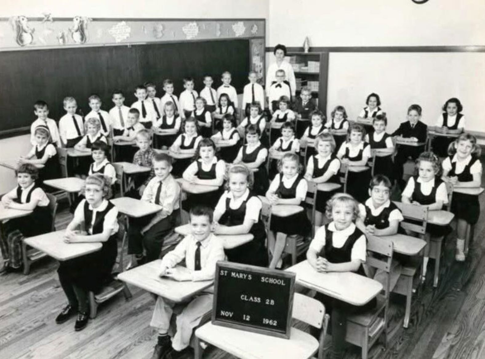 Leo is standing, fourth from left, in this classroom photo from St. Mary’s School of the Assumption in Chicago in 1962.