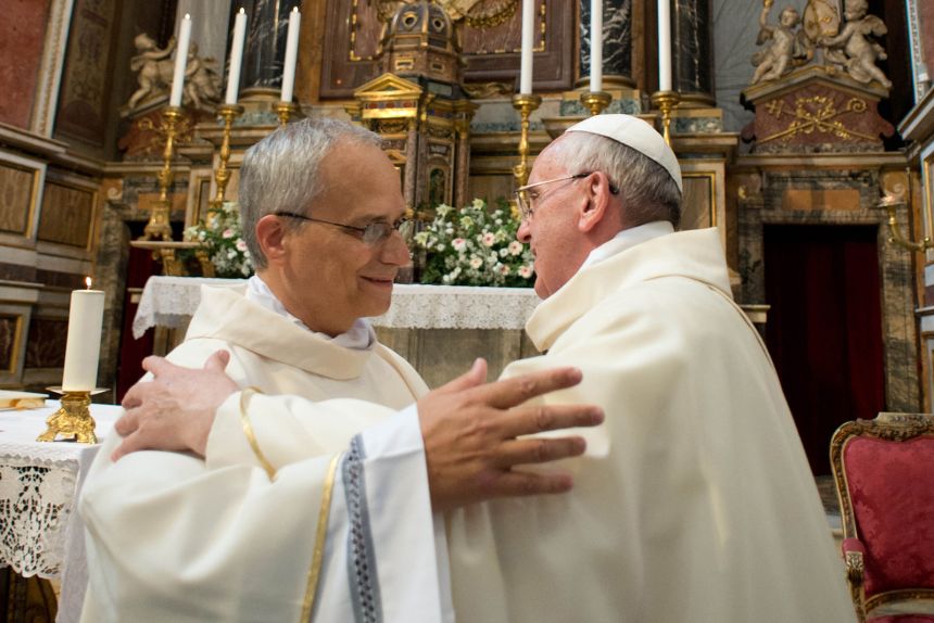Pope Francis, right, embraces Robert F. Prevost during a meeting with Augustinian priests at Sant’Agostino Church in Rome, on August 28, 2013.
