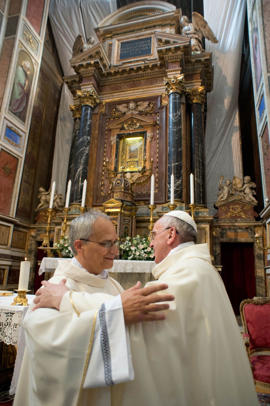 Leo embraces Pope Francis, the man he would eventually succeed, during a meeting Francis held with Augustinian priests in Rome in August 2013.